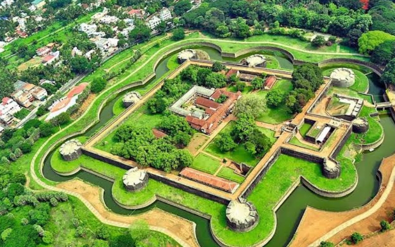 A majestic view of Palakkad Fort, a historical landmark in Kerala, with its well-preserved structure, surrounding greenery, and serene atmosphere.